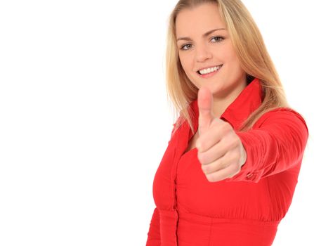 Attractive blond woman making thumbs up sign. All on white background.