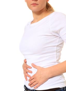 Attractive blonde woman suffering from stomachache. All on white background.