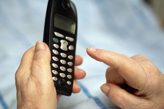 Care-dependent person making a phone call.