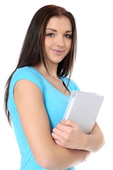 Attractive teenage girl holding her school papers. All on white background.