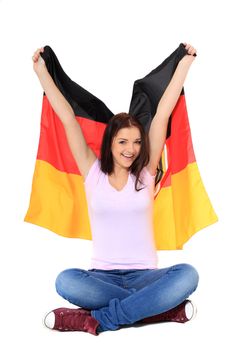 Cheering woman with german flag sitting on the floor. All on white background.