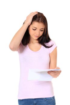 Attractive teenage girl getting bad news. All on white background.