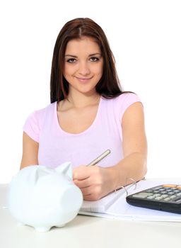 Attractive teenage girl organizing her savings. All on white background.