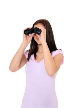 Attractive teenage girl using spyglass. All on white background.