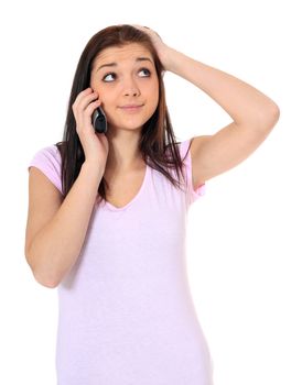Attractive teenage girl talking on the phone. All on white background.
