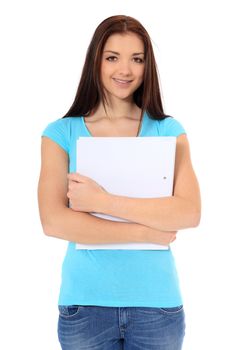 Attractive teenage girl holding her school papers. All on white background.