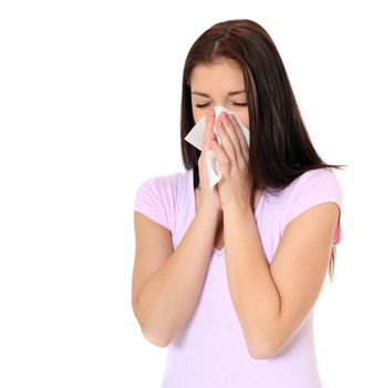 Attractive teenage girl got a cold. All on white background.