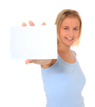 Portrait of an attractive young girl holding blank white card. All on white background.