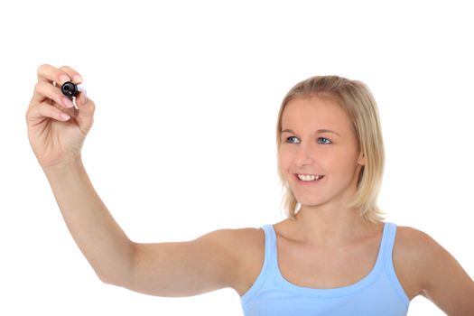 Attractive young scandinavian woman using black marker. All on white background