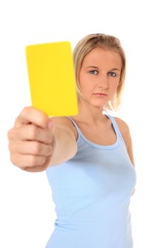 Attractive young scandinavian woman showing yellow card. All on white background