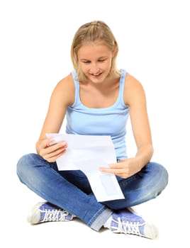 Attractive young scandinavian woman reading a letter. All on white background.