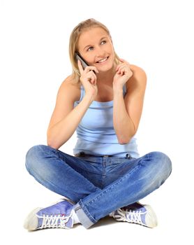 Attractive young scandinavian woman making a phone call. All on white background.