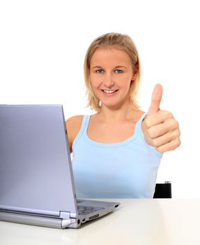 Attractive young scandinavian woman using notebook computer. All on white background.