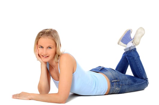 Attractive scandinavian girl lying on floor. All on white background.