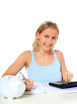Attractive young scandinavian woman calculating her budget. All on white background.