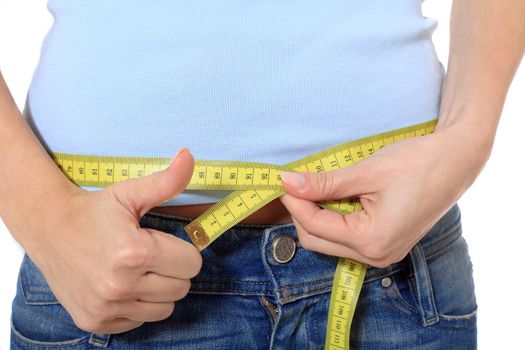 Female person measuring her hip. All on white background.