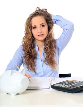 Portrait of a frustrated young girl doing her budgeting. All on white background.