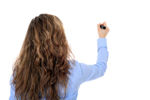 Back view of an attractive young girl using a marker. All on white background.