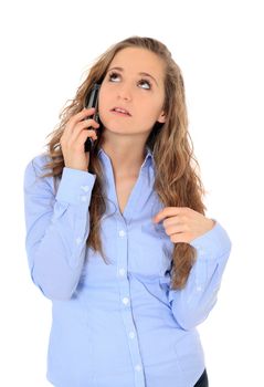 Portrait of an attractive young girl making a phone call. All on white background.