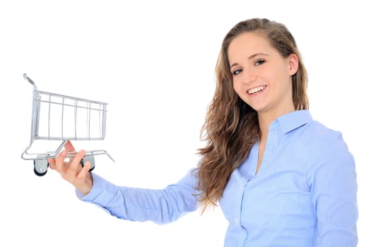 Portrait of an attractive young girl holding a small shopping cart. All on white background.