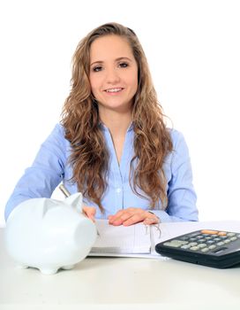 Portrait of an attractive young girl doing her budgeting. All on white background.