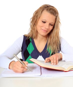 Attractive young student learning. All on white background.