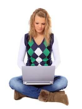 Attractive young woman using notebook computer. All on white background.