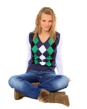 Attractive young woman sitting on the floor. All on white background.