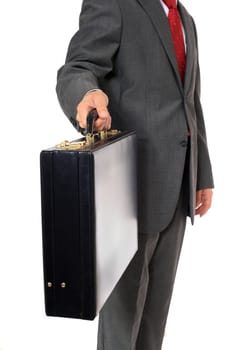 Businessman hands over important documents in a briefcase. All isolated on white background.