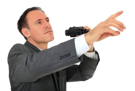 Attractive businessman using spyglass. All on white background.