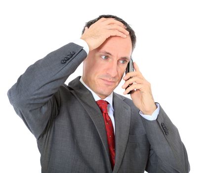 Businessman getting bad news. All on white background.