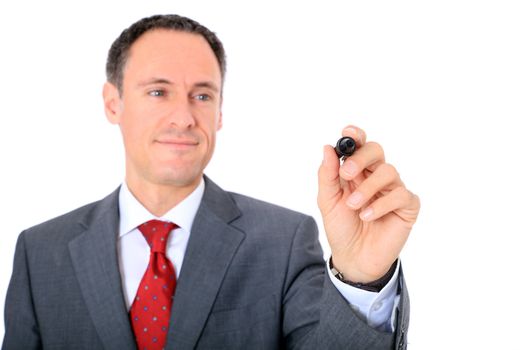 Attractive businessman using marker. Focus on hand ind foreground. All on white background.