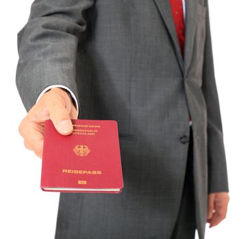 Businessman showing his german passport. All on white background.