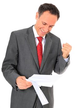 Cheering businessman reading letter. All on white background.