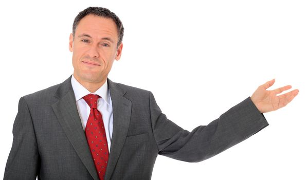 Attractive businessman pointing to the side. All on white background.