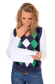 Attractive blonde woman getting bad news. All on white background.