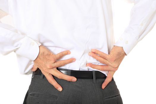 Businessman suffering from backache. All on white background.