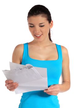 An attractive young woman getting good news via mail. All on white background.