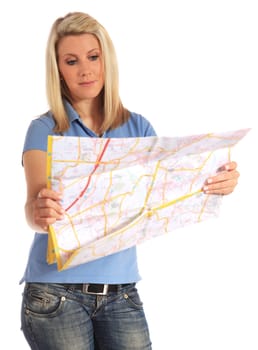 Attractive young woman looking at a map. All on white background.