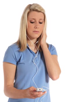 Attractive young woman got earache from listening to loud music through earphones. All on white background.