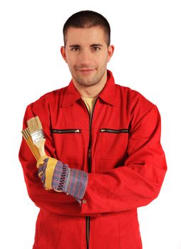 Young painter in red overall. All on white background.