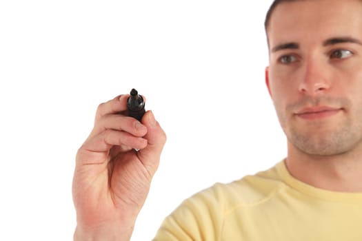 Attractive young man using a marker. All on white background.