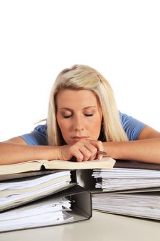 Attractive young student taking nap on her documents. All on white background.