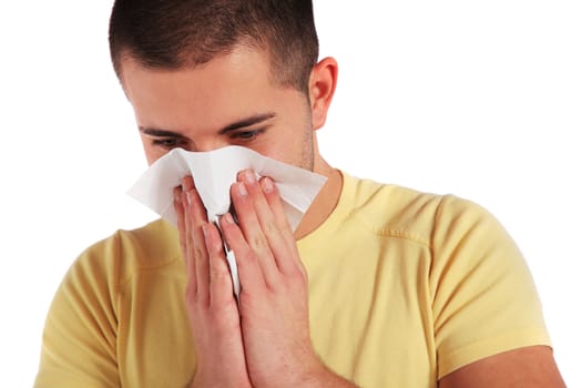 Attractive young man got a cold. All isolated on white background.