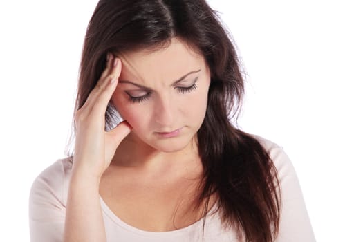 Attractive young woman suffering from headache. All on white background.