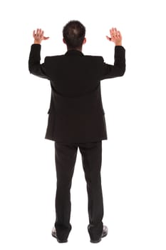 Backview of a businessman lifting his arms. extra copy space. All on white background.