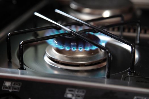 Typical blue gas flame of a gas stove.