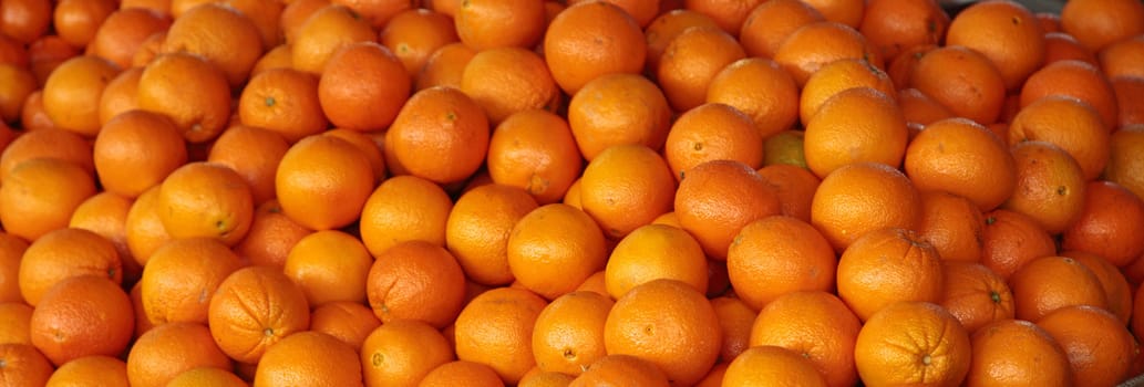 Juicy oranges background texture.