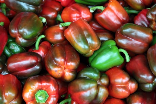 Green and red pepper background texture.