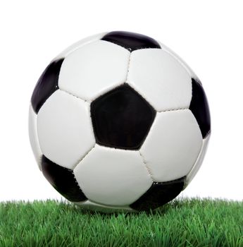 Soccer ball on green grass. All on white background.